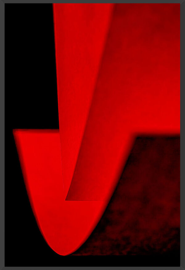 Red arrow shape intersecting a curve in red.
