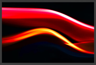 Streams of color on a black background.