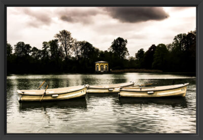 Rowboats on a calm lake.