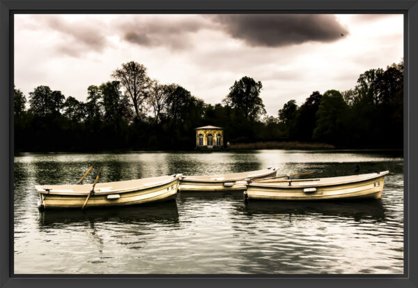 Rowboats on a calm lake.